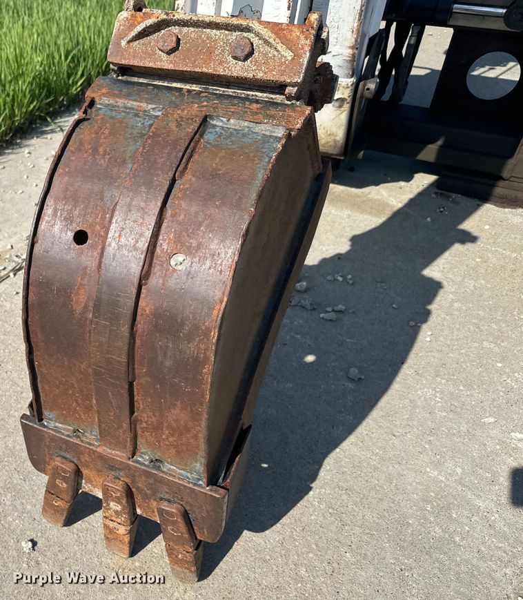 image for item EJ2704 Bobcat 709 Backhoe skid steer backhoe