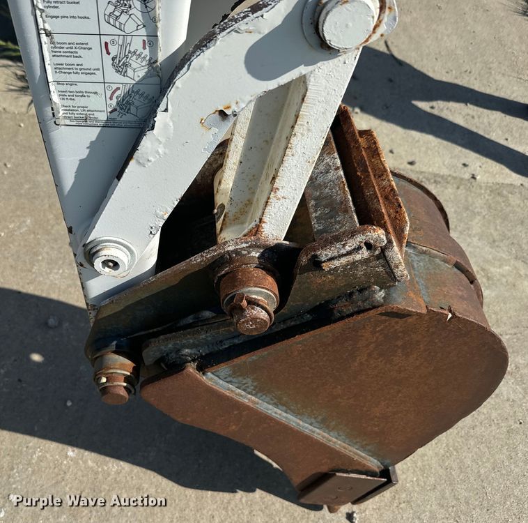 image for item EJ2704 Bobcat 709 Backhoe skid steer backhoe