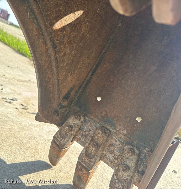 image for item EJ2704 Bobcat 709 Backhoe skid steer backhoe