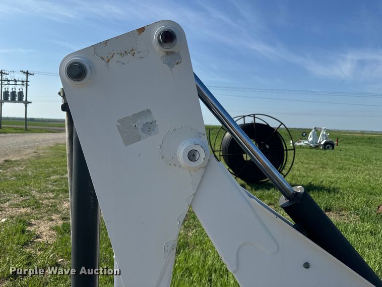 image for item EJ2704 Bobcat 709 Backhoe skid steer backhoe