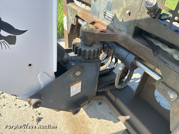 image for item EJ2704 Bobcat 709 Backhoe skid steer backhoe