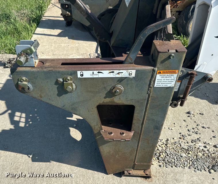 image for item EJ2704 Bobcat 709 Backhoe skid steer backhoe