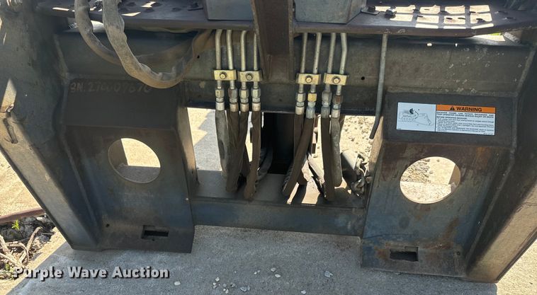 image for item EJ2704 Bobcat 709 Backhoe skid steer backhoe