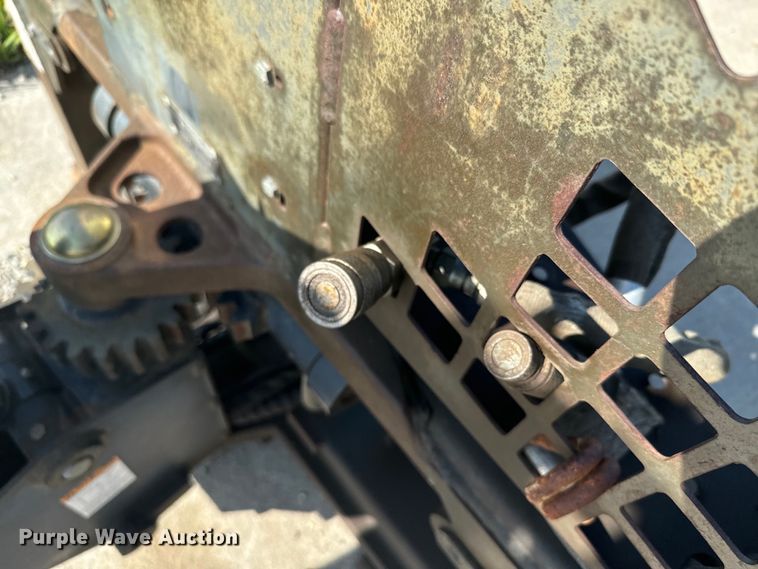 image for item EJ2704 Bobcat 709 Backhoe skid steer backhoe