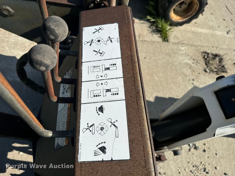 image for item EJ2704 Bobcat 709 Backhoe skid steer backhoe