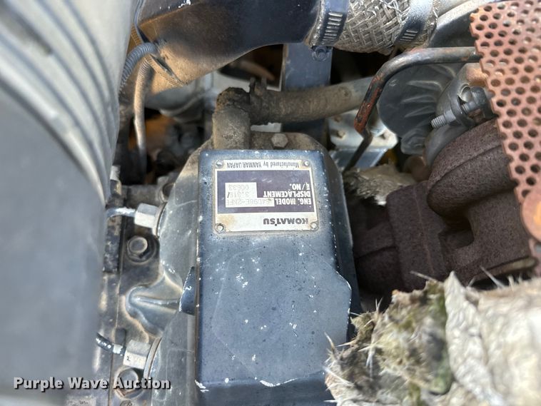 image for item EJ2728 2004 Komatsu 1020 skid steer loader