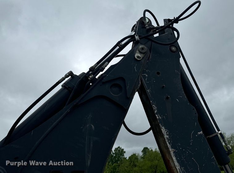 image for item ND9313 2015 John Deere 310SL backhoe