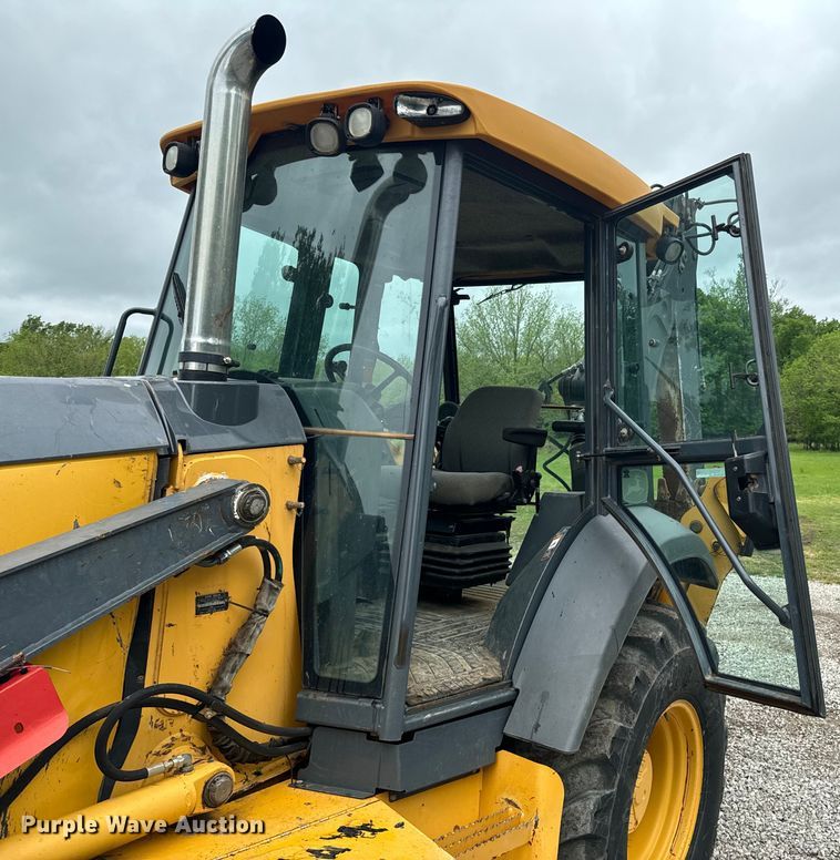 image for item ND9313 2015 John Deere 310SL backhoe