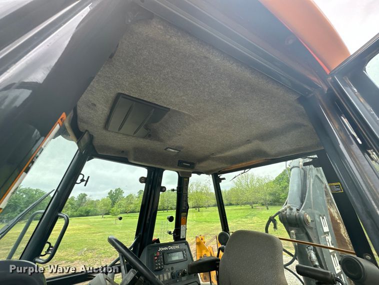 image for item ND9313 2015 John Deere 310SL backhoe