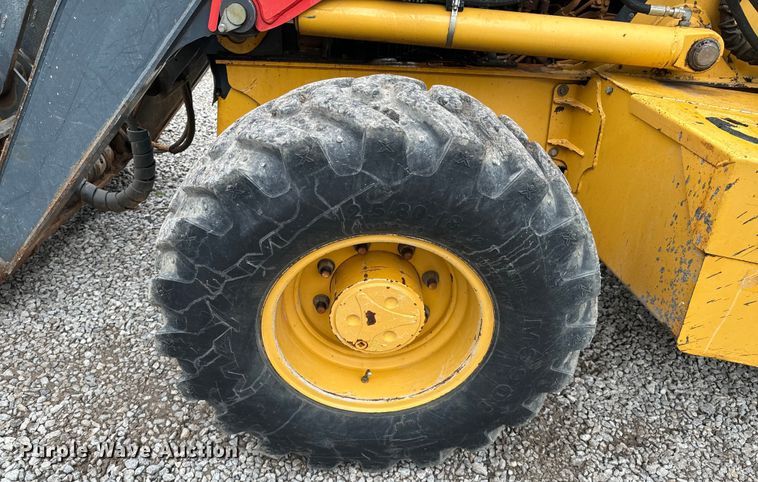 image for item ND9313 2015 John Deere 310SL backhoe