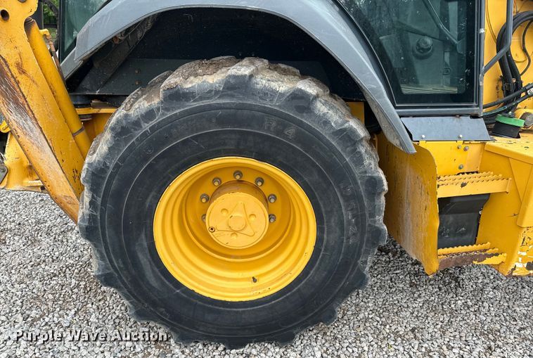 image for item ND9313 2015 John Deere 310SL backhoe