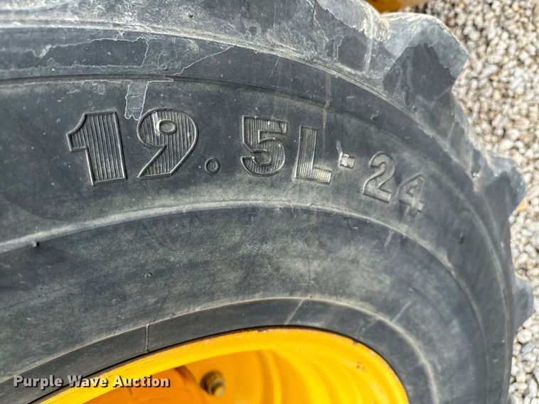 image for item ND9313 2015 John Deere 310SL backhoe