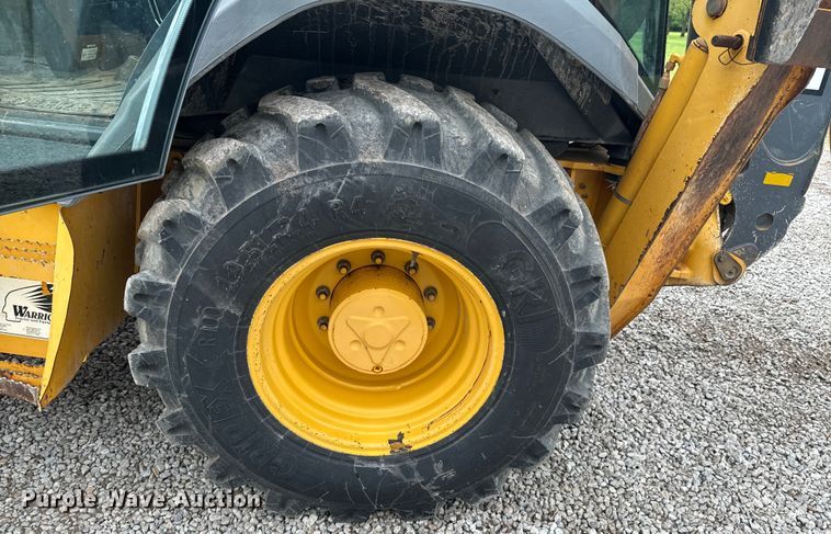 image for item ND9313 2015 John Deere 310SL backhoe