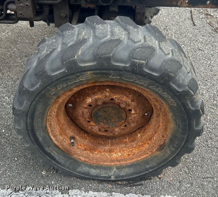 image for item EG0357 New Holland TC30  MFWD tractor