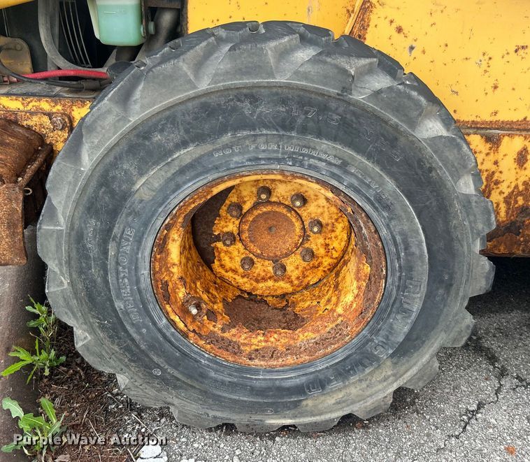 image for item EG0358 John Deere 332  skid steer loader