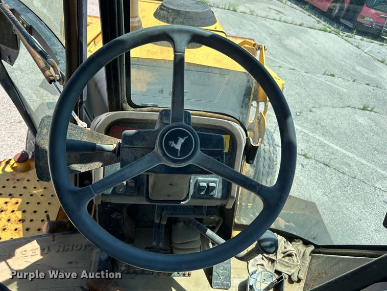 image for item EG0391 1998 John Deere 310SE backhoe