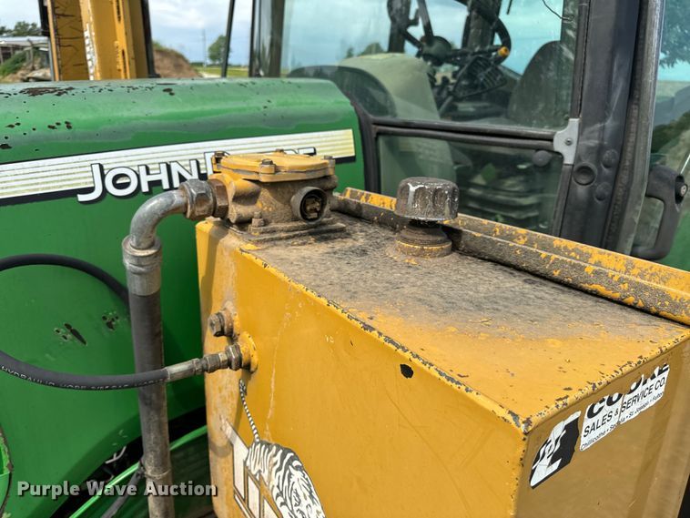 image for item EH6783 2006 John Deere 6615 MFWD tractor