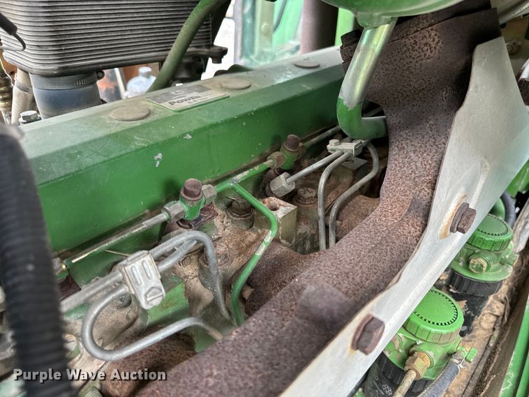 image for item EH6783 2006 John Deere 6615 MFWD tractor