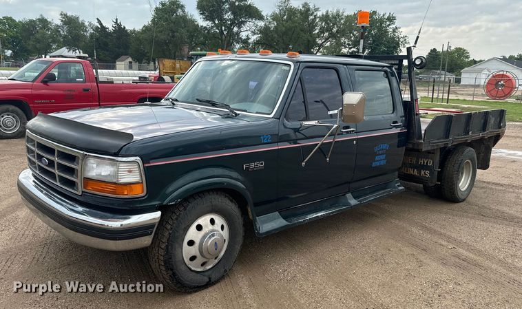 image for item EJ2823 1994 Ford F350 XLT Crew Cab flatbed pickup truck