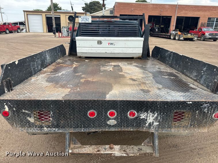 image for item EJ2823 1994 Ford F350 XLT Crew Cab flatbed pickup truck