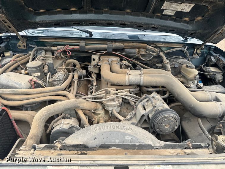 image for item EJ2823 1994 Ford F350 XLT Crew Cab flatbed pickup truck