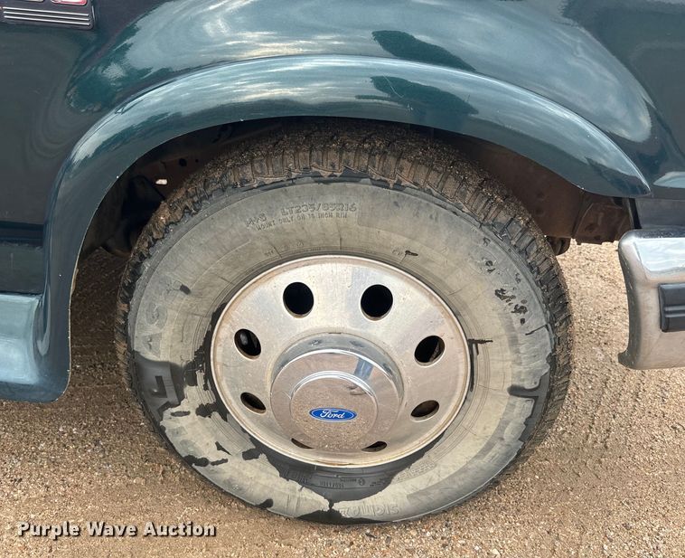 image for item EJ2823 1994 Ford F350 XLT Crew Cab flatbed pickup truck