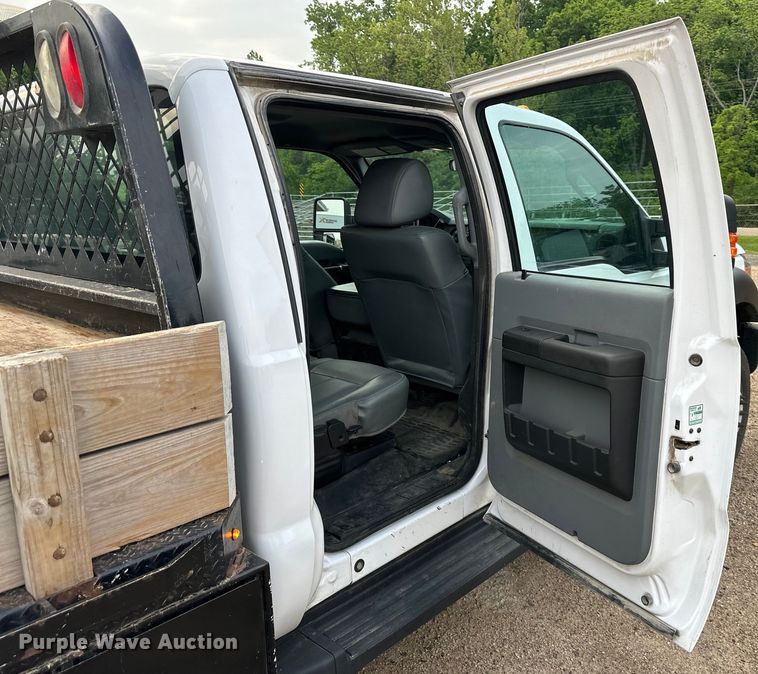 image for item NT9235 2016 Ford F450 Super Duty Crew Cab flatbed truck