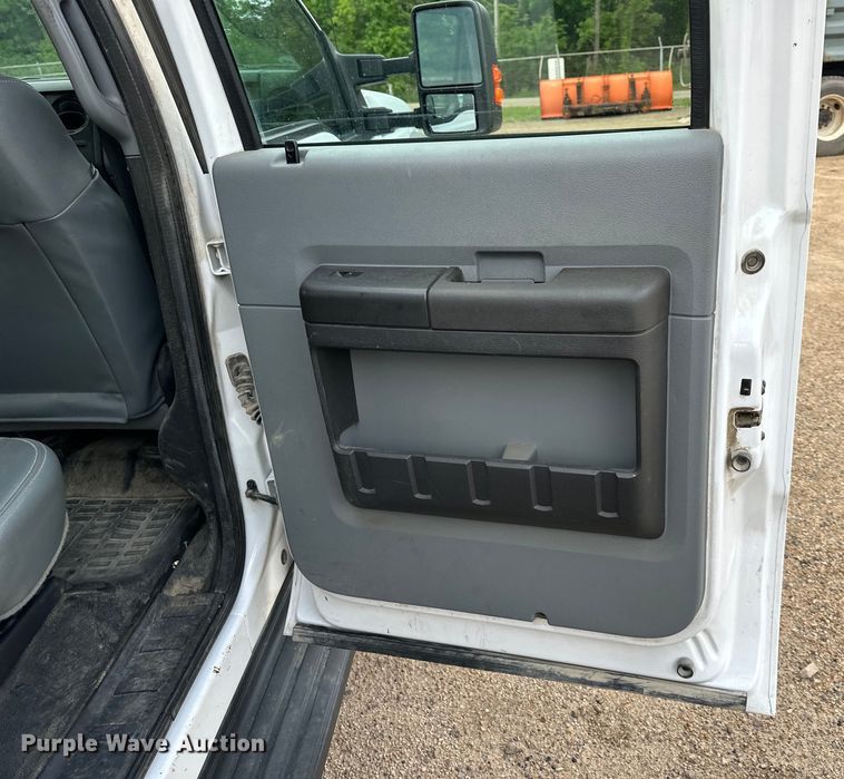 image for item NT9235 2016 Ford F450 Super Duty Crew Cab flatbed truck