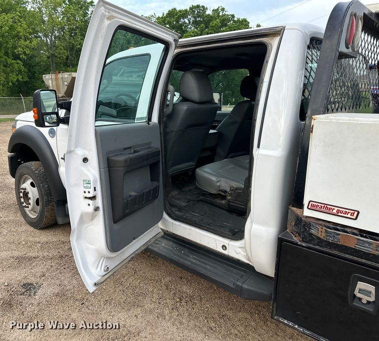 image for item NT9235 2016 Ford F450 Super Duty Crew Cab flatbed truck