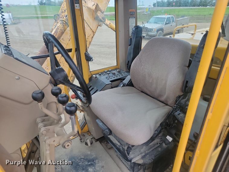 image for item NZ9852 1999 John Deere 772CH motor grader