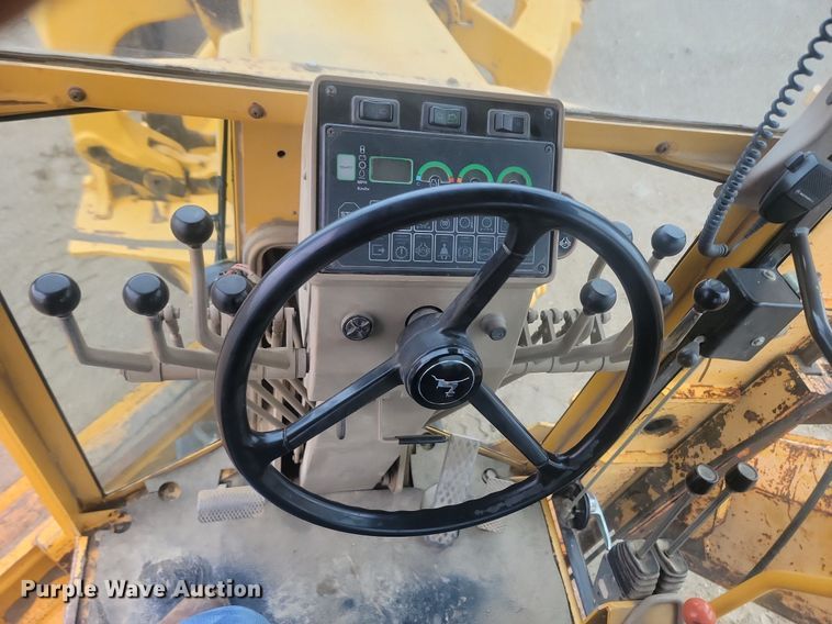 image for item NZ9852 1999 John Deere 772CH motor grader