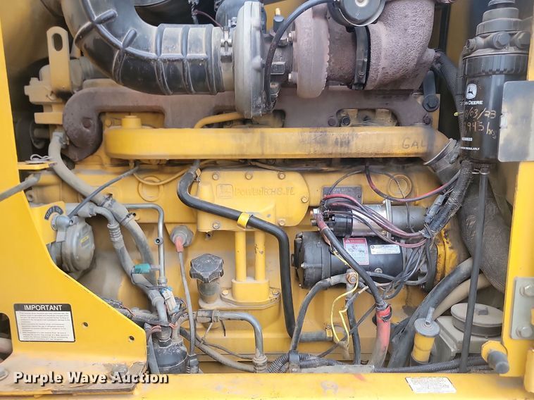 image for item NZ9852 1999 John Deere 772CH motor grader