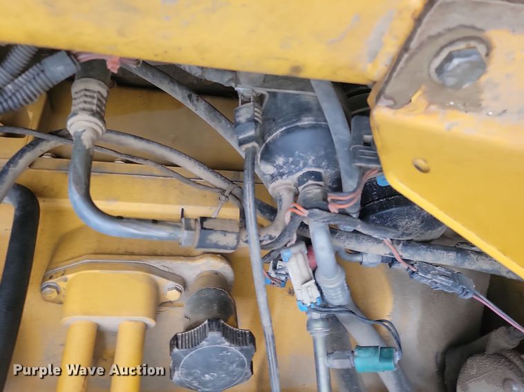 image for item NZ9852 1999 John Deere 772CH motor grader