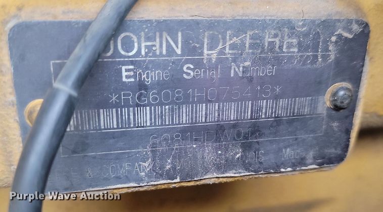 image for item NZ9852 1999 John Deere 772CH motor grader