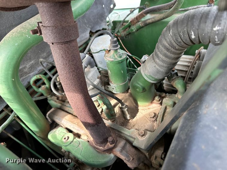 image for item OI9165 1982 John Deere L125L skid steer loader