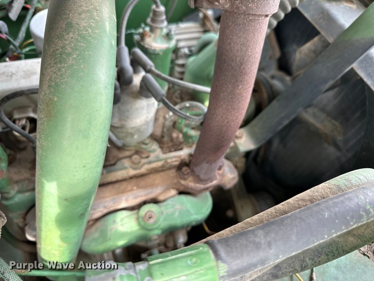 image for item OI9165 1982 John Deere L125L skid steer loader