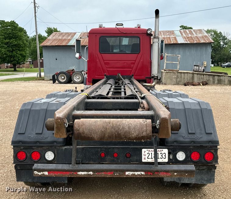 image for item ND9349 2005 Mack CV713 roll-off container truck