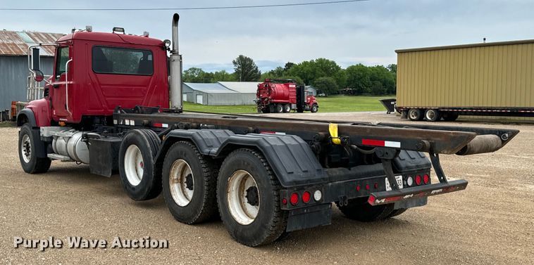 image for item ND9349 2005 Mack CV713 roll-off container truck