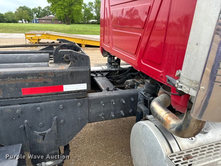 image for item ND9349 2005 Mack CV713 roll-off container truck