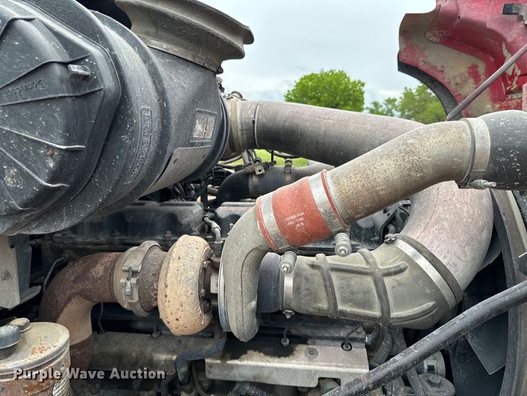 image for item ND9349 2005 Mack CV713 roll-off container truck