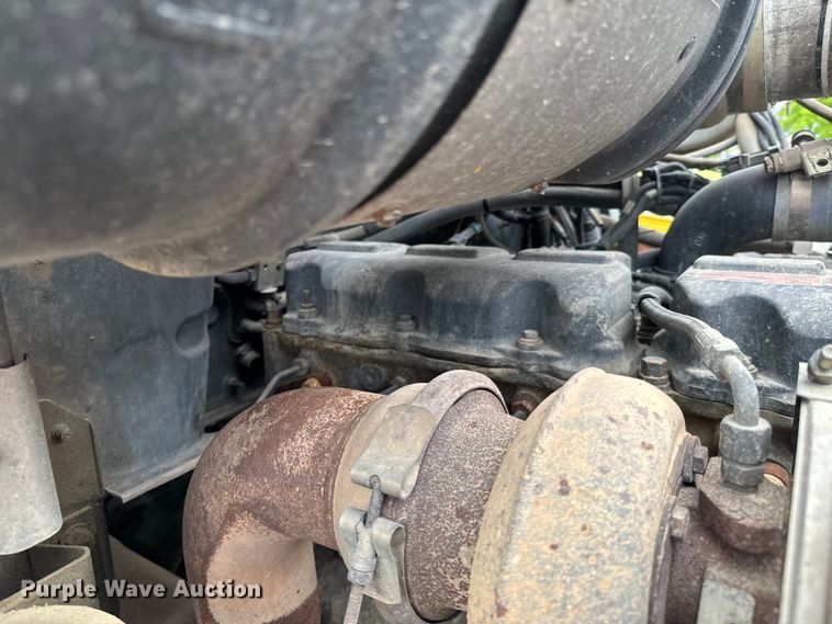 image for item ND9349 2005 Mack CV713 roll-off container truck