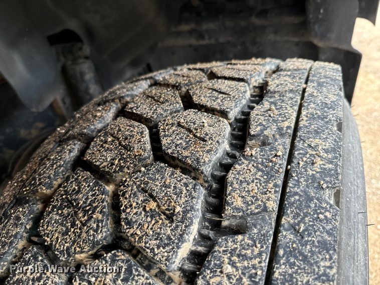 image for item ND9349 2005 Mack CV713 roll-off container truck