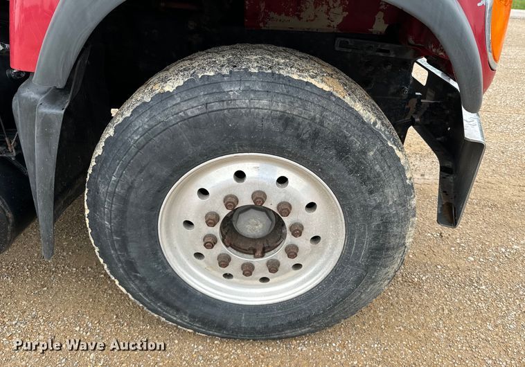 image for item ND9349 2005 Mack CV713 roll-off container truck