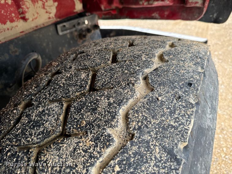 image for item ND9349 2005 Mack CV713 roll-off container truck