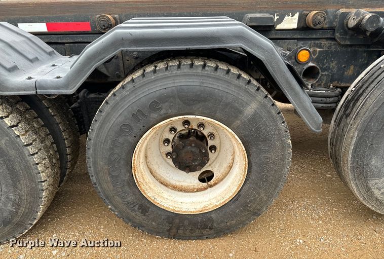 image for item ND9349 2005 Mack CV713 roll-off container truck