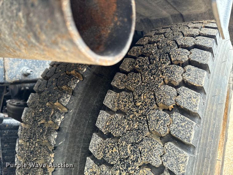 image for item ND9349 2005 Mack CV713 roll-off container truck