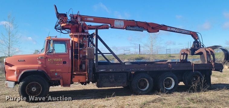 image for item NZ9833 1992 Ford  L9000 log loading truck 