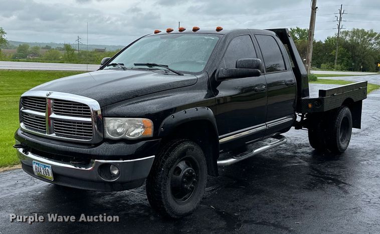 image for item DQ0834 2005 Dodge  Ram 3500 Quad Cab flatbed pickup truck