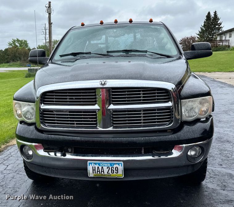 image for item DQ0834 2005 Dodge  Ram 3500 Quad Cab flatbed pickup truck