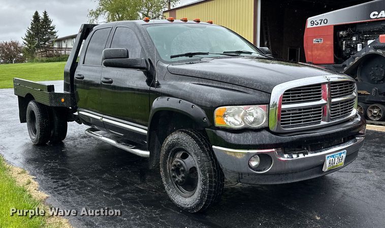 image for item DQ0834 2005 Dodge  Ram 3500 Quad Cab flatbed pickup truck